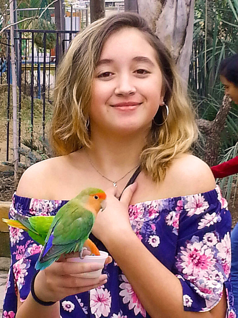 Girl feeding birds